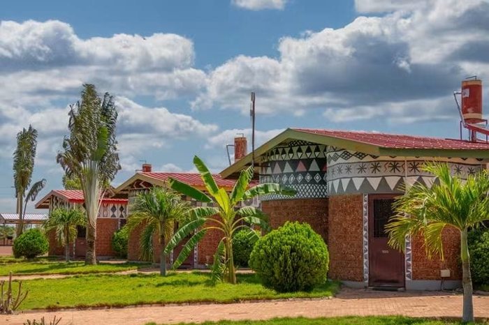 Decorative patterned building exterior with planted gardens