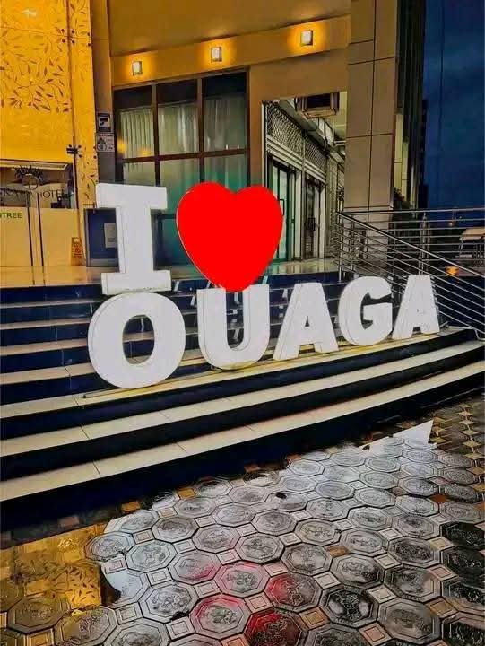 I love Ouaga sign illuminated in the evening