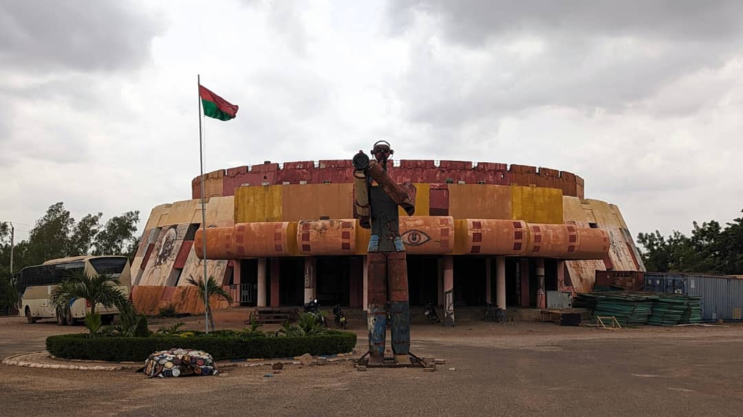 The filmmaker statue at the Place des Cinéastes roundabout in Ouagadougou